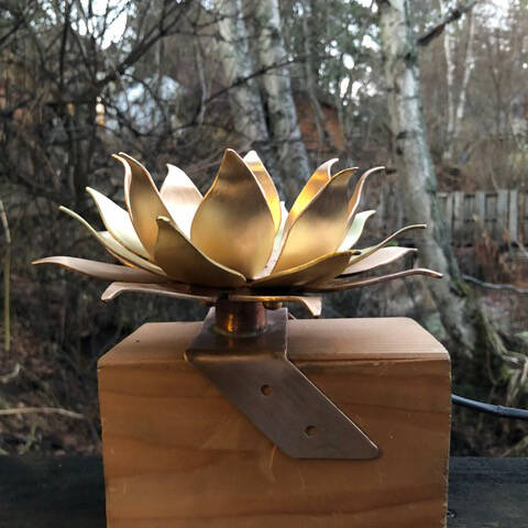 Bronze Lotus Lamp by Art Koeninger created for the Loved and Lost Memorial Bench, based on a design by Brad Hughes, Homer, 2022. (Photo provided by Art Koeninger)