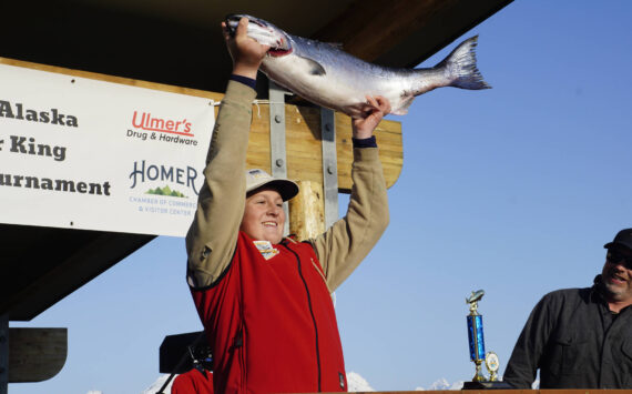 Photo by Michael Armstrong/Homer News
The 28th annual Homer Winter King Salmon Tournament winner Weston Marley holds up the 27.38-pound winter king salmon he caught on Sunday, April 10, 2022, in Kachemak Bay.