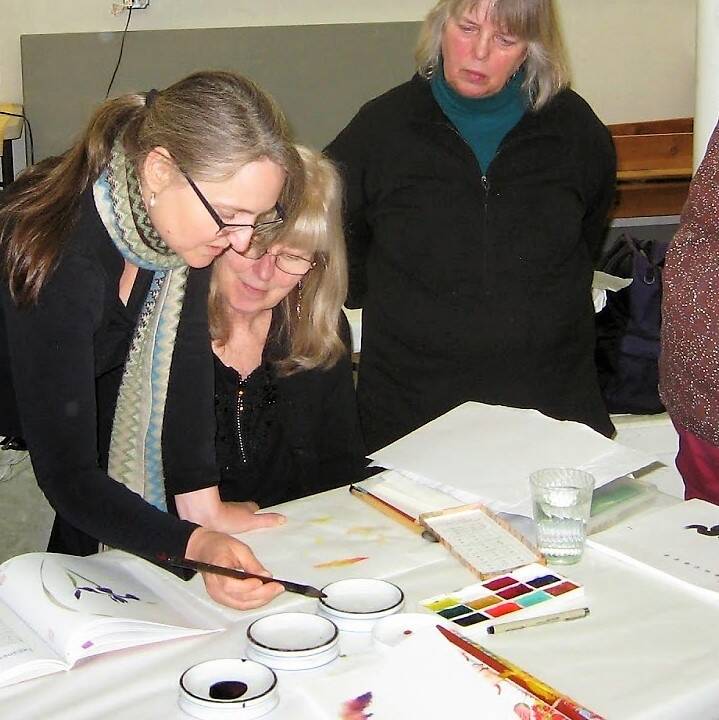 Sharlene Cline teaches with Claudia Caffee-DeLapp and Renee Jahnke during a Kachemak Bay Watercolor Society workshop in 2014 at Homer Art & Frame. (Photo provided by Sharlene Cline/Homer News)