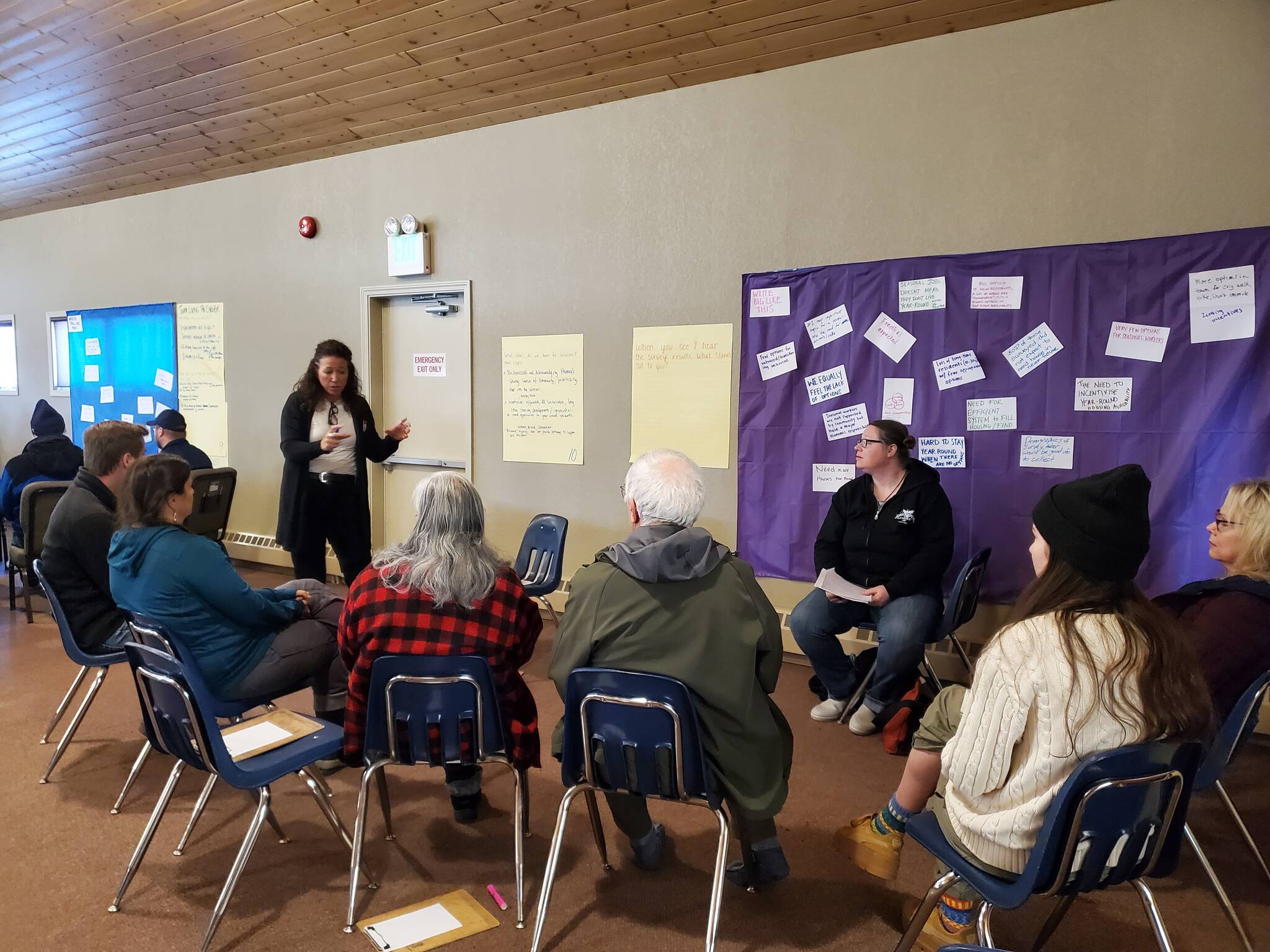 A small group discusses common themes in the ongoing housing crisis during the community conversation on housing solutions in the greater Homer area at Christian Community Church on Saturday. Photo by Delcenia Cosman
