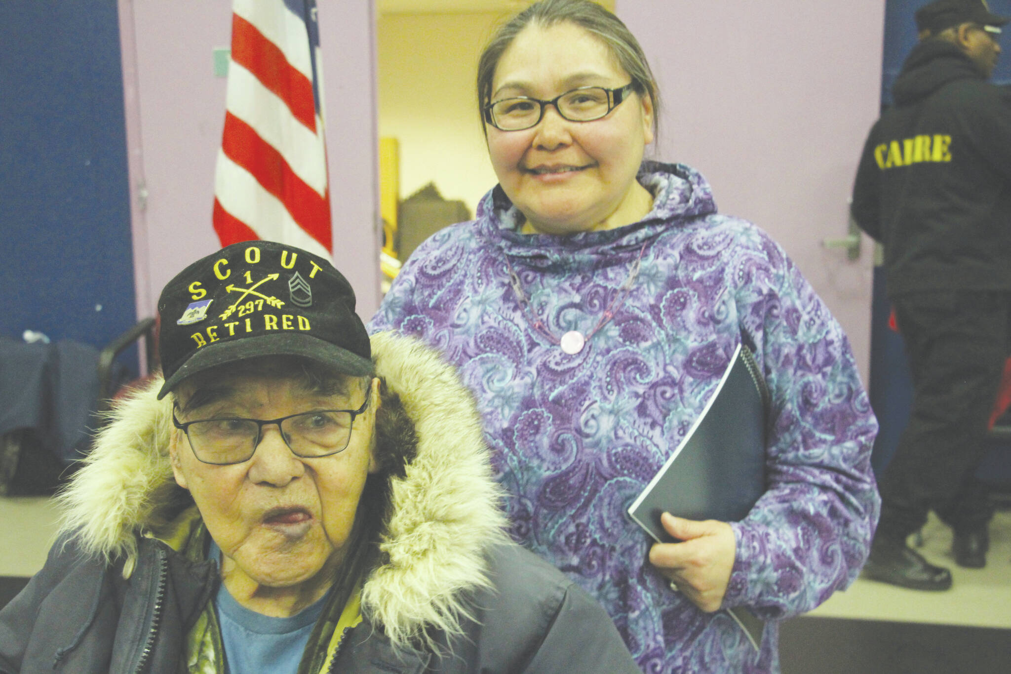 AP Photo/Mark Thiessen
This March 28 photo shows Bruce Boolowon, left, posing with his eldest daughter, Rhona Pani Apassingok, at an Alaska National Guard ceremony in Gambell. Maj. Gen. Torrence Saxe, the adjutant general of the Alaska National Guard, presented Alaska Heroism Medals to Boolowon, the last surviving guardsman of 16 who helped rescue 11 Navy crewmen after they crash landed on St. Lawrence Island on June 22, 1955, and to the family members of 15 other guardsman who are now deceased.
