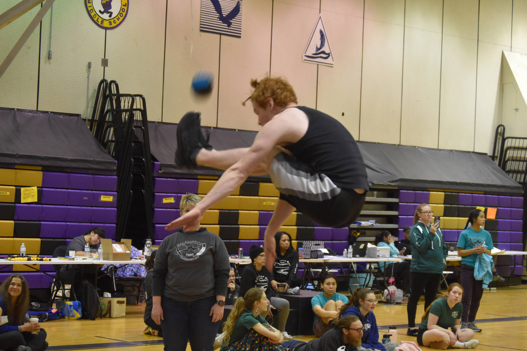Jake Dye/Peninsula Clarion
Homer’s Elijah Gordon performs the 2-Foot High Kick during the Salamatof Tribe Traditional Native Games Invitational at Kenai Middle School in Kenai, Alaska, on Friday, April 14, 2023. Gordon would ultimately place 2nd in the event.