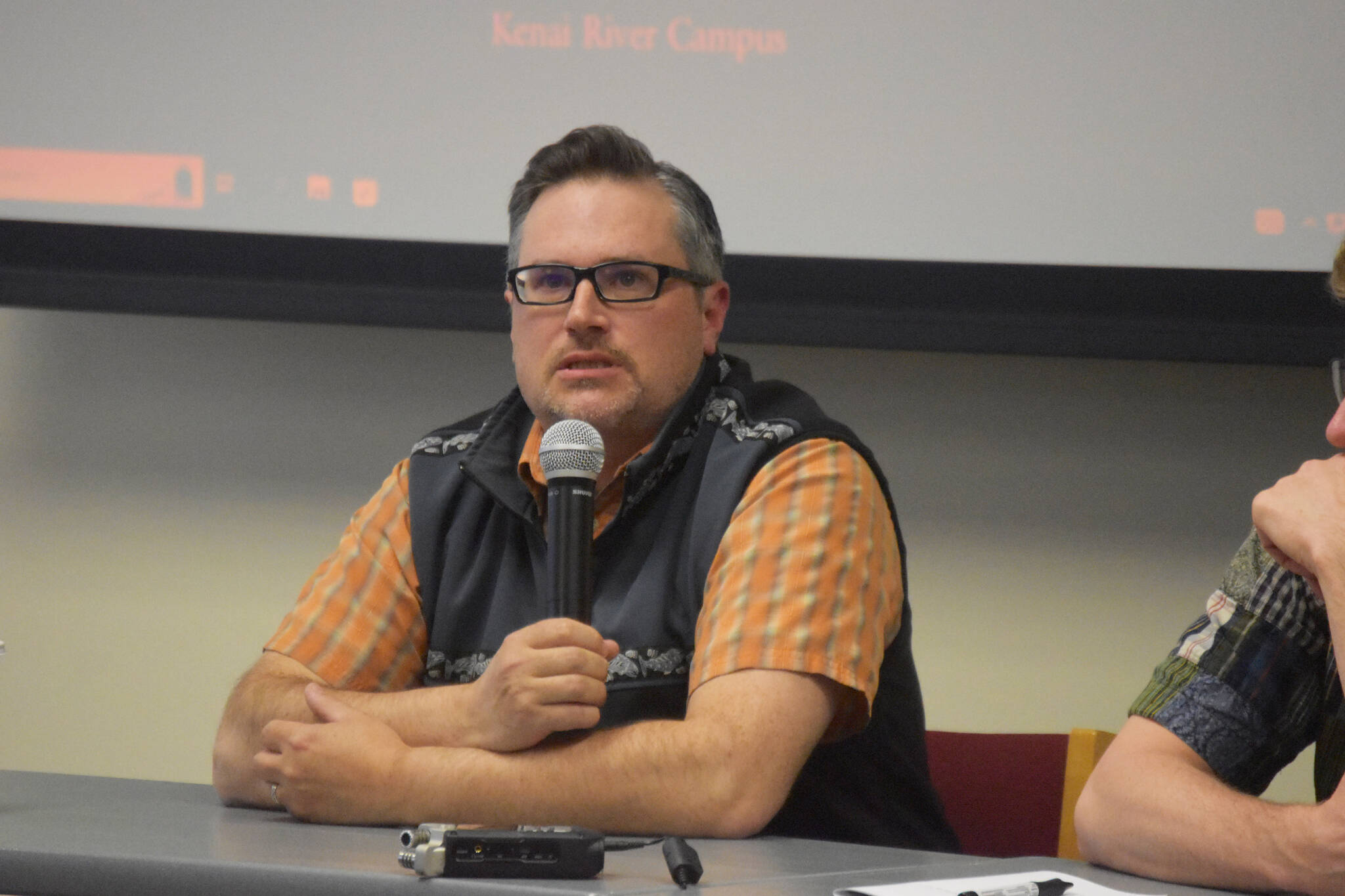 University of Alaska Fairbanks Associate Professor Dr. Peter Westley responds to a question during a panel discussion for the Kenai Peninsula College Showcase “State of the Salmon” on Wednesday, April 20, 2023, at KPC in Soldotna, Alaska. (Jake Dye/Peninsula Clarion)