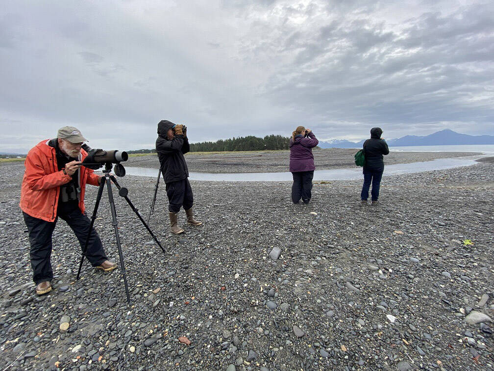 Kachemak Bay Birders stand at the mouth of the Slough onto Bishop’s Beach, during a birding trip to Beluga Slough, spring 2021. (Photo taken by Kathy Eagle/courtesy)