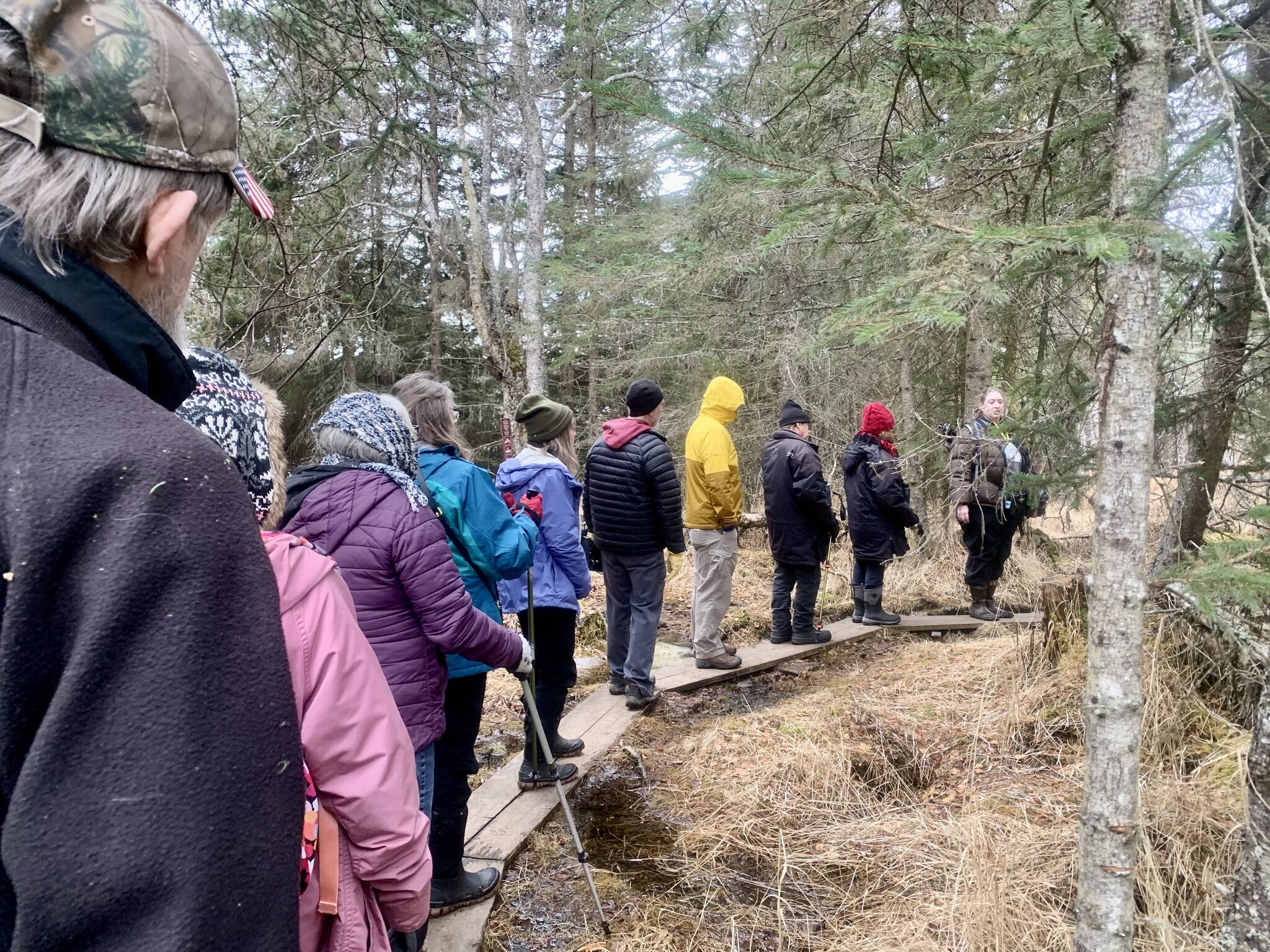 Community members and visitors enjoy a Beginner’s Bird Walk on the Calvin and Coyle Trail guided by AMNWR Visitor Center Manager Lora Hollar on Thursday, May 4. Photo by Christina Whiting