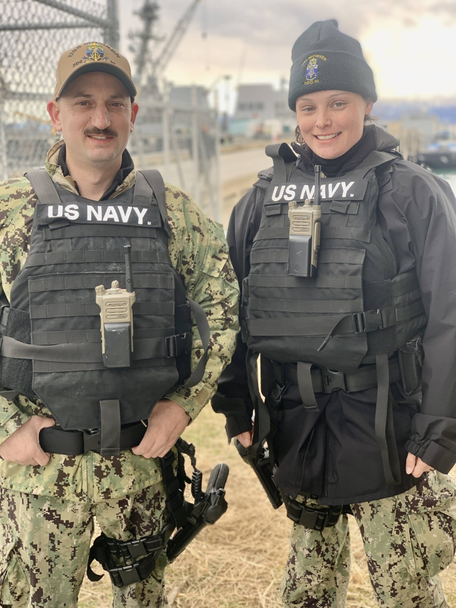 Electronics Technician’s II, Owen Florey and Brenna Winter-Chavez, both from California, greet community members viewing the USS Momsen DDG 92 missile destroyer on Thursday, May 4. Photo by Christina Whiting