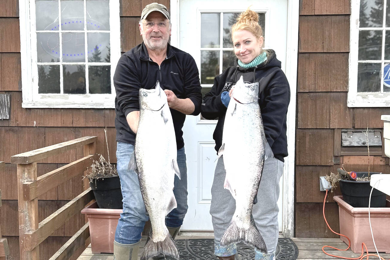 The 28th annual Anchor Point King Salmon Tournament first and second place winners, Judy Persnail (right) and Mark Tornai (left) from the boat Outlaw hold up their fish during weigh-in on Saturday, May 6 at the Anchor Point Chamber of Commerce building in Anchor Point, Alaska. Photo courtesy of Mcki Needham