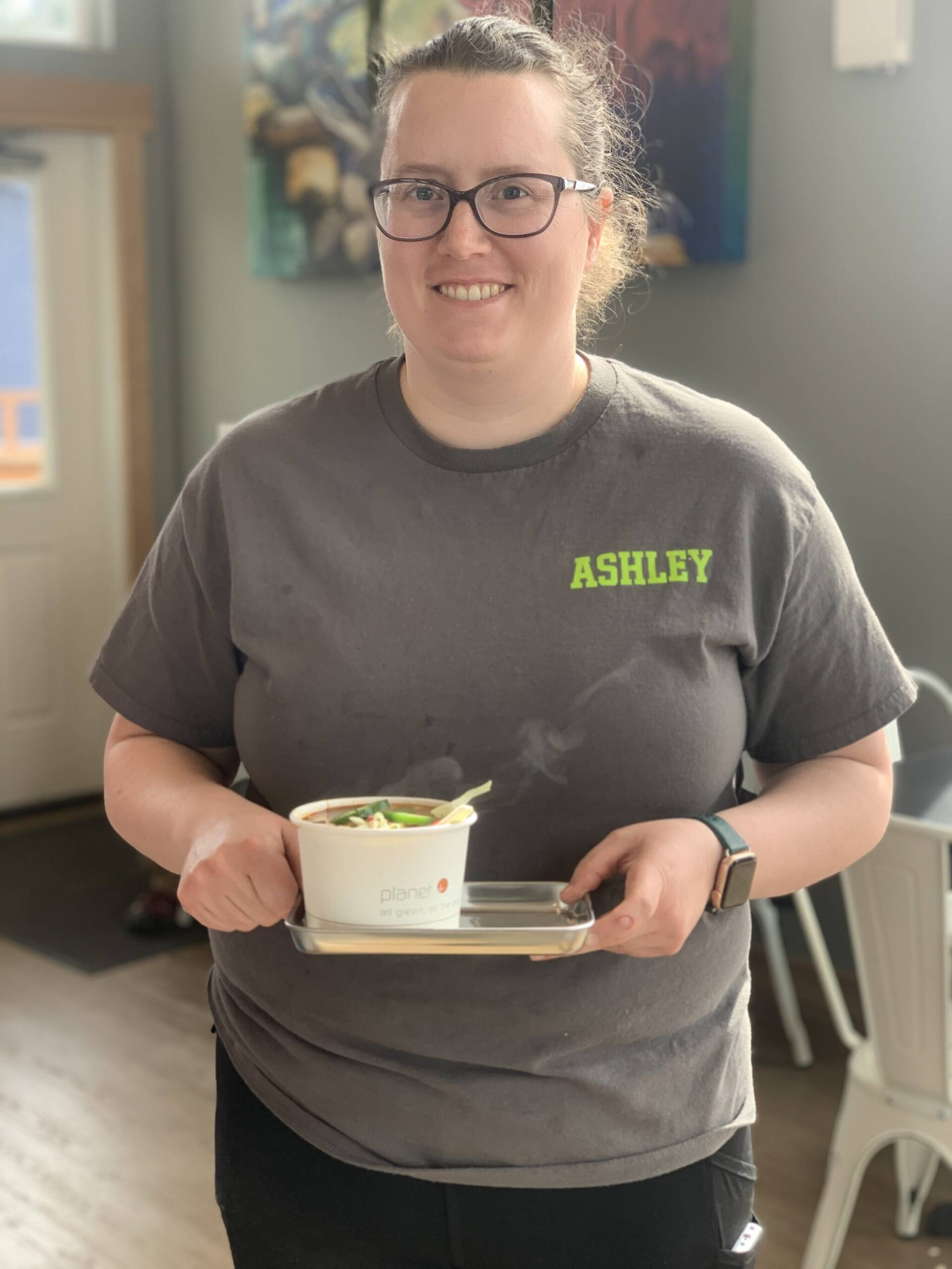 Ashley Steiner, owner of The Tickled Pear, serves a Mexican soup dish on opening day at her new location, May 5, 2023, in Homer, Alaska. (Photo by Christina Whiting/Homer News)