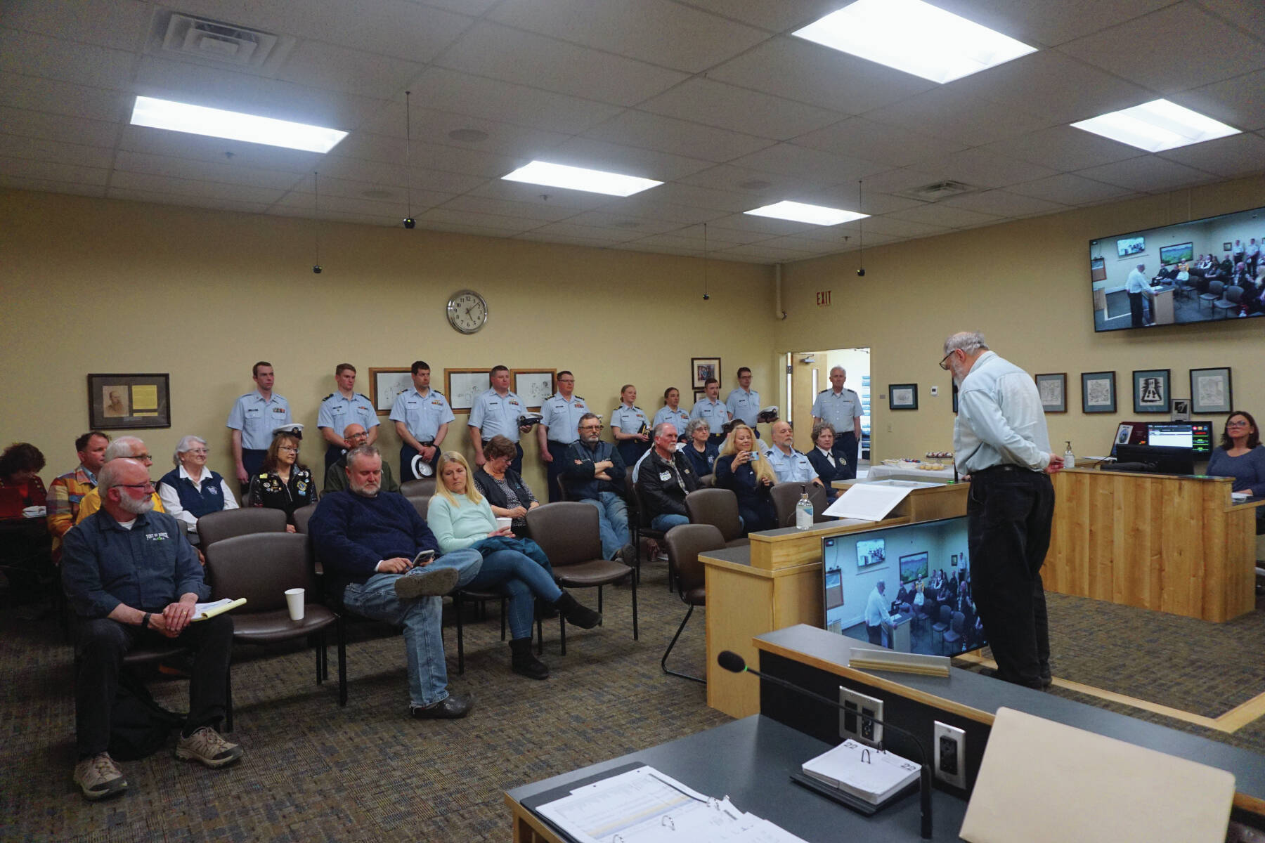 Mayor Ken Castner reads a proclamation announcing Homer as an official Coast Guard City at Homer City Hall on May 22. (Photo provided by Homer city manager)