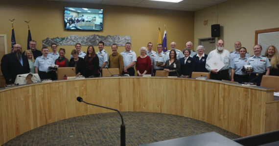 Homer City Council and representatives from the U.S. Coast Guard recognize Homer as a Coast Guard City at Homer City Hall on May 22, 2023. (Photo provided by Homer city manager)
