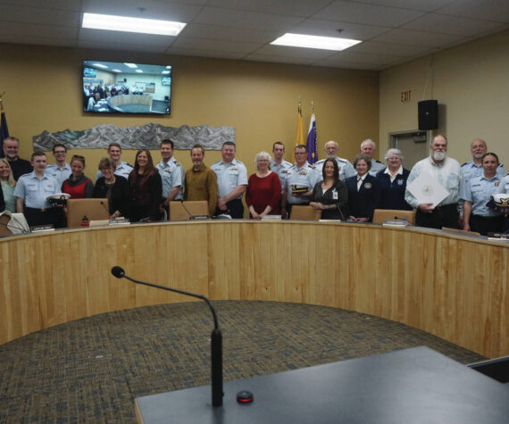 Homer City Council and representatives from the U.S. Coast Guard recognize Homer as a Coast Guard City at Homer City Hall on May 22, 2023. (Photo provided by Homer city manager)