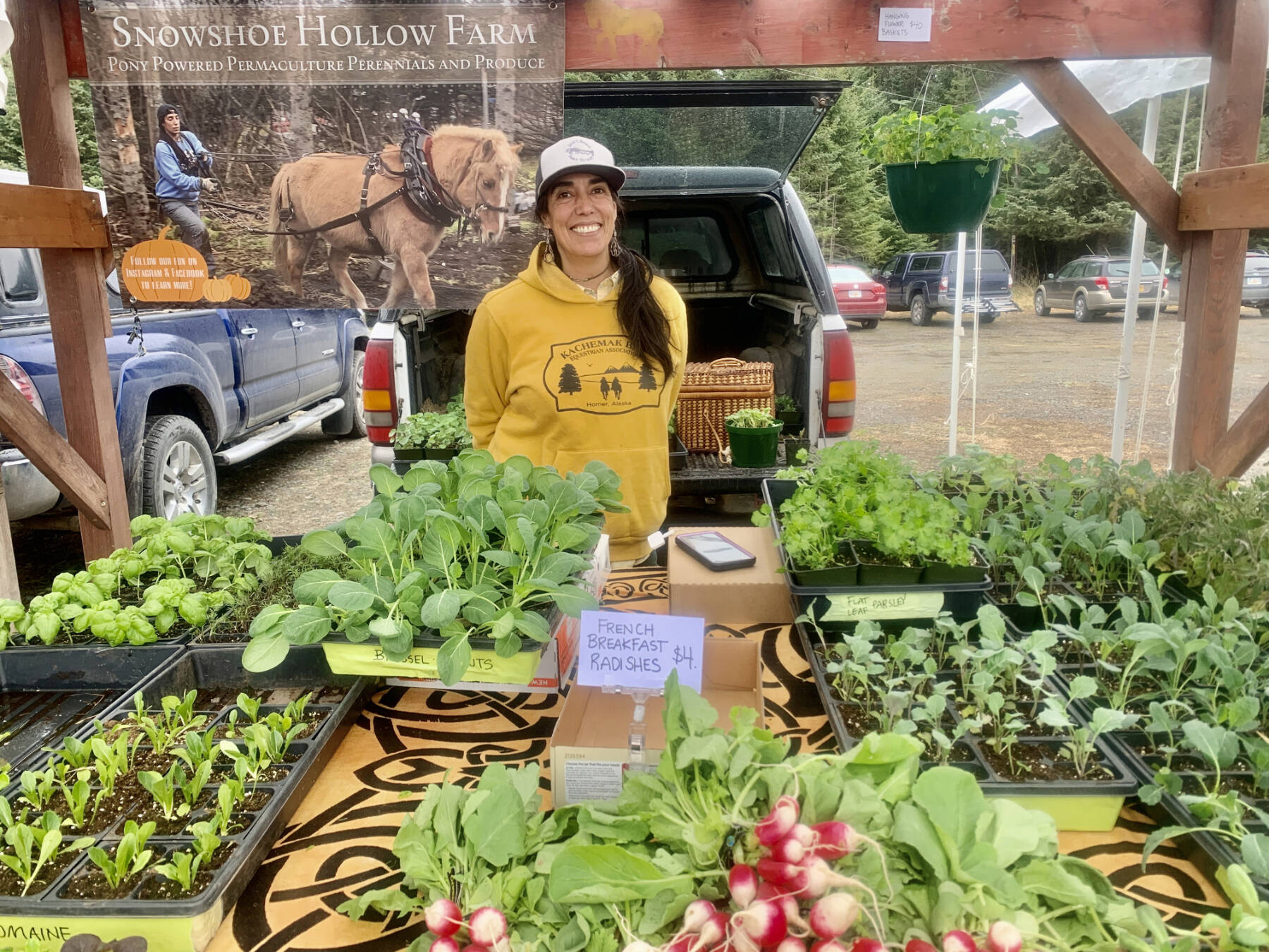 Christina Castellanos of Snowshoe Hollow Farm vends at the Homer Farmers Market on opening day, Saturday, May 27, 2023 in Homer, Alaska. Photo by Christina Whiting