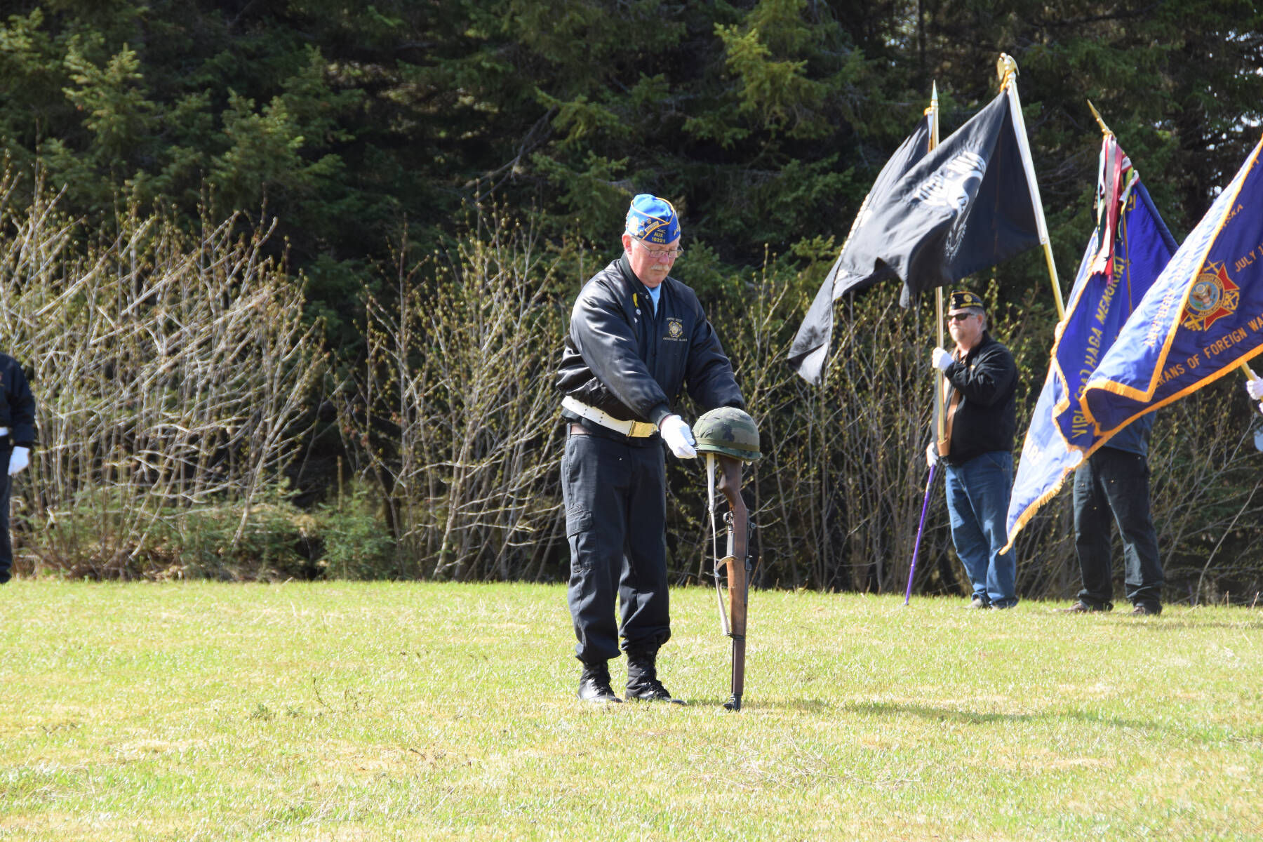 VFW Post 10221 member Eric Henley performs the battlefield cross during a Memorial Day service held at the Anchor Point Kallman Cemetery on Monday, May 29, 2023 in Anchor Point, Alaska. (Delcenia Cosman/Homer News)