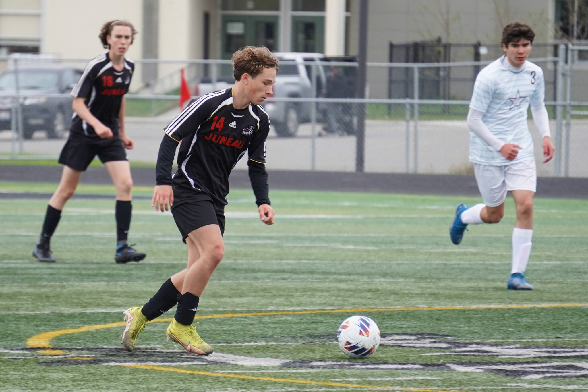 Juneau-Douglas’ Kai Ciambor moves at the ball during the Division II Soccer State Championship on Saturday, May 27, 2023, at West Anchorage High School in Anchorage, Alaska. (Jake Dye/Peninsula Clarion)