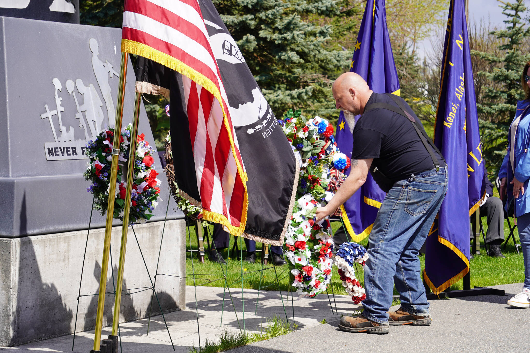 Wreaths are placed honoring fallen soldiers during a Memorial Day ceremony on Monday, May 29, 2023, at Leif Hanson Memorial Park in Kenai, Alaska. (Jake Dye/Peninsula Clarion)