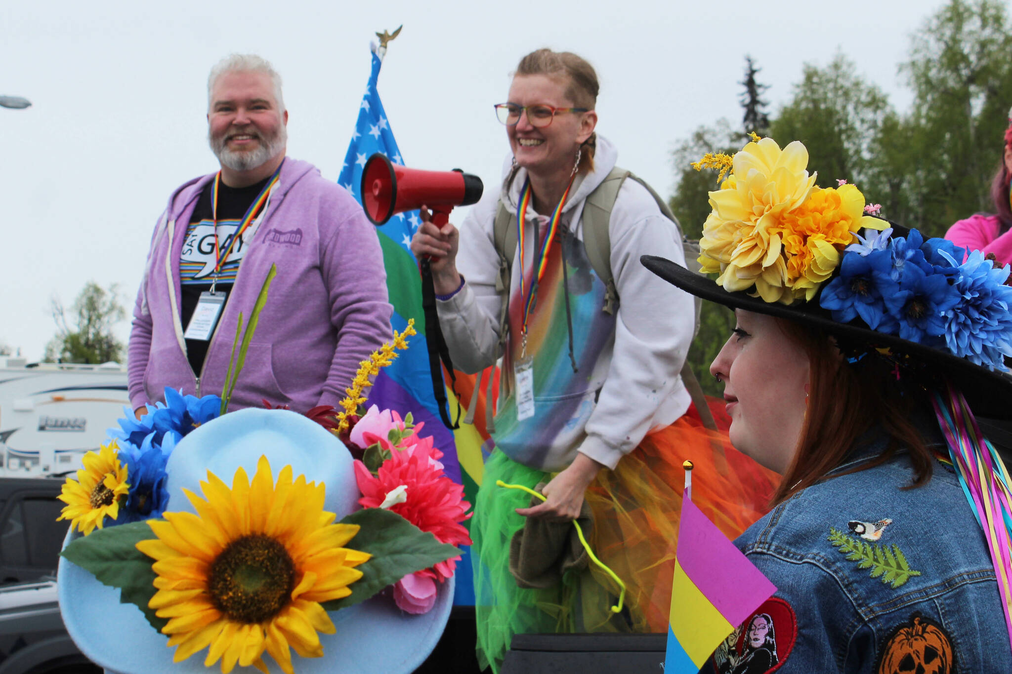 David Brighton (left) and Leslie Byrd (right) prepare to lead marchers from the Soldotna Regional Sports Complex to Soldotna Creek Park as part of Soldotna Pride in the Park on Saturday, June 3, 2023 in Soldotna, Alaska. (Ashlyn O’Hara/Peninsula Clarion)