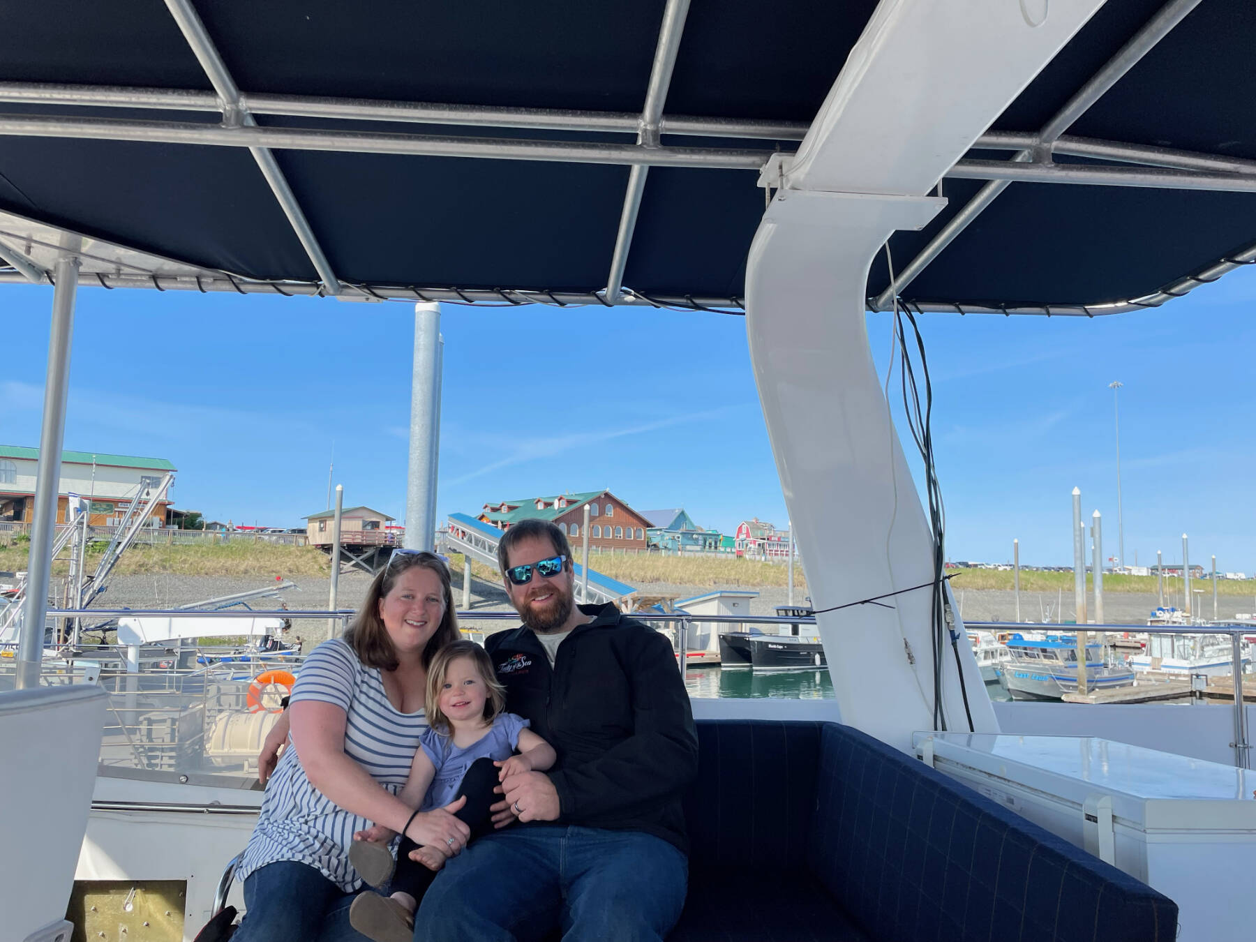 (from left to right) Lauren, Nora and Rand Seaton, owners of P/V Lady of the Sea and their new business venture, Lady of the Sea Adventures, are photographed on Thursday, June 1, 2023 at the Homer Harbor in Homer, Alaska. Photo by Amanda Campbell