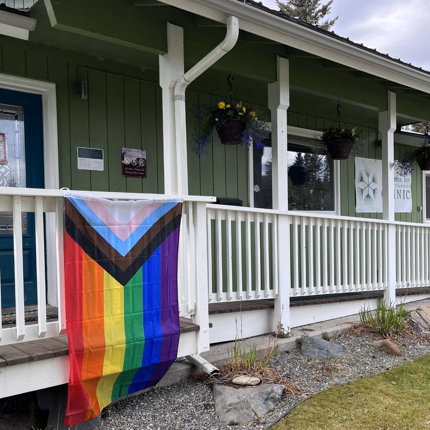 The newly-replaced Pride flag hangs in front of the Kachemak Bay Family Planning Clinic entrance in June 2023 in Homer, Alaska. Photo by the REC Room