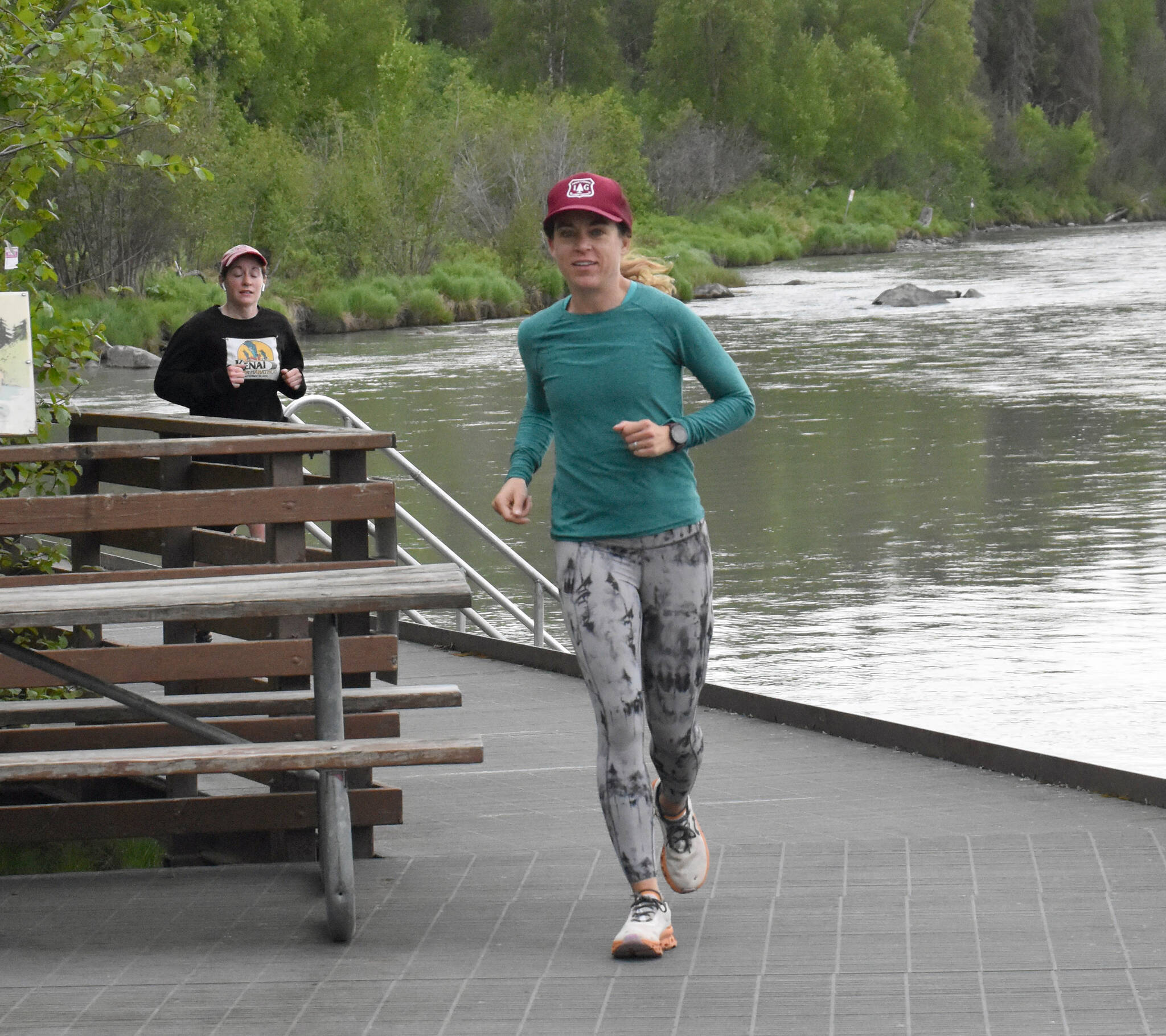 Anchorage’s Carrie Setian leads Soldotna’s Jenny Neyman in the Tsalteshi Backyard Ultra on Friday, June 9, 2023, along the Kenai River in Soldotna, Alaska. Setian won the event. (Photo by Jeff Helminiak/Peninsula Clarion)