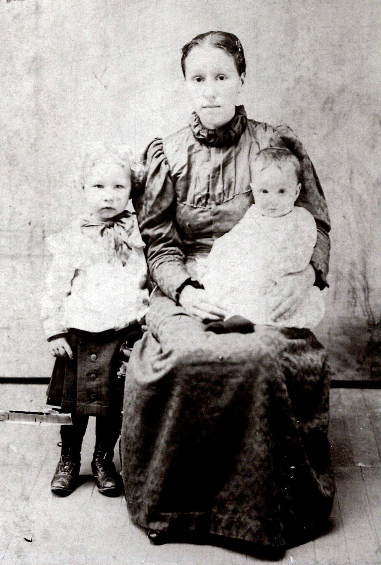 Photo courtesy of the Brennan Family Collection
This 1901 photo shows May King with her two eldest children, Floyd (standing) and Mary (on May’s lap).