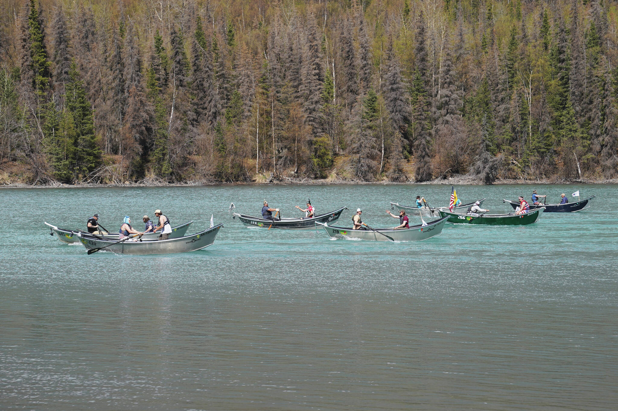 Contestants race down the Kenai River during the 16th Annual Cooper Landing Drift Boat Regata near the Eagle Landing Resort in Cooper Landing, Alaska, on Saturday, May 20, 2023. (Jake Dye/Peninsula Clarion)
