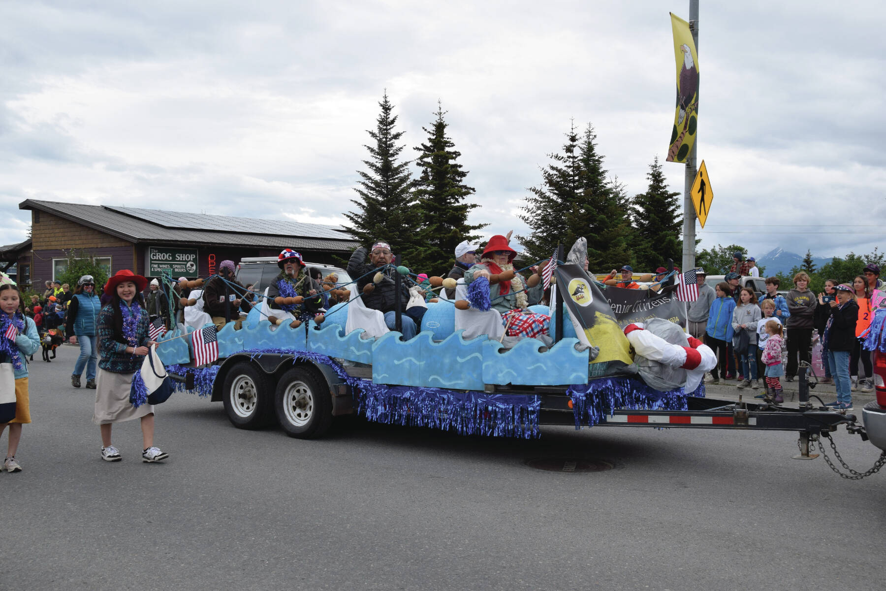 Emilie Springer/Homer News
The Homer Senior Citizen Center float rides the tide down East Pioneer Avenue during the “Seas the Day” parade on Tuesday, July 4<ins>, 2023</ins> in Homer<ins>, Alaska</ins>.