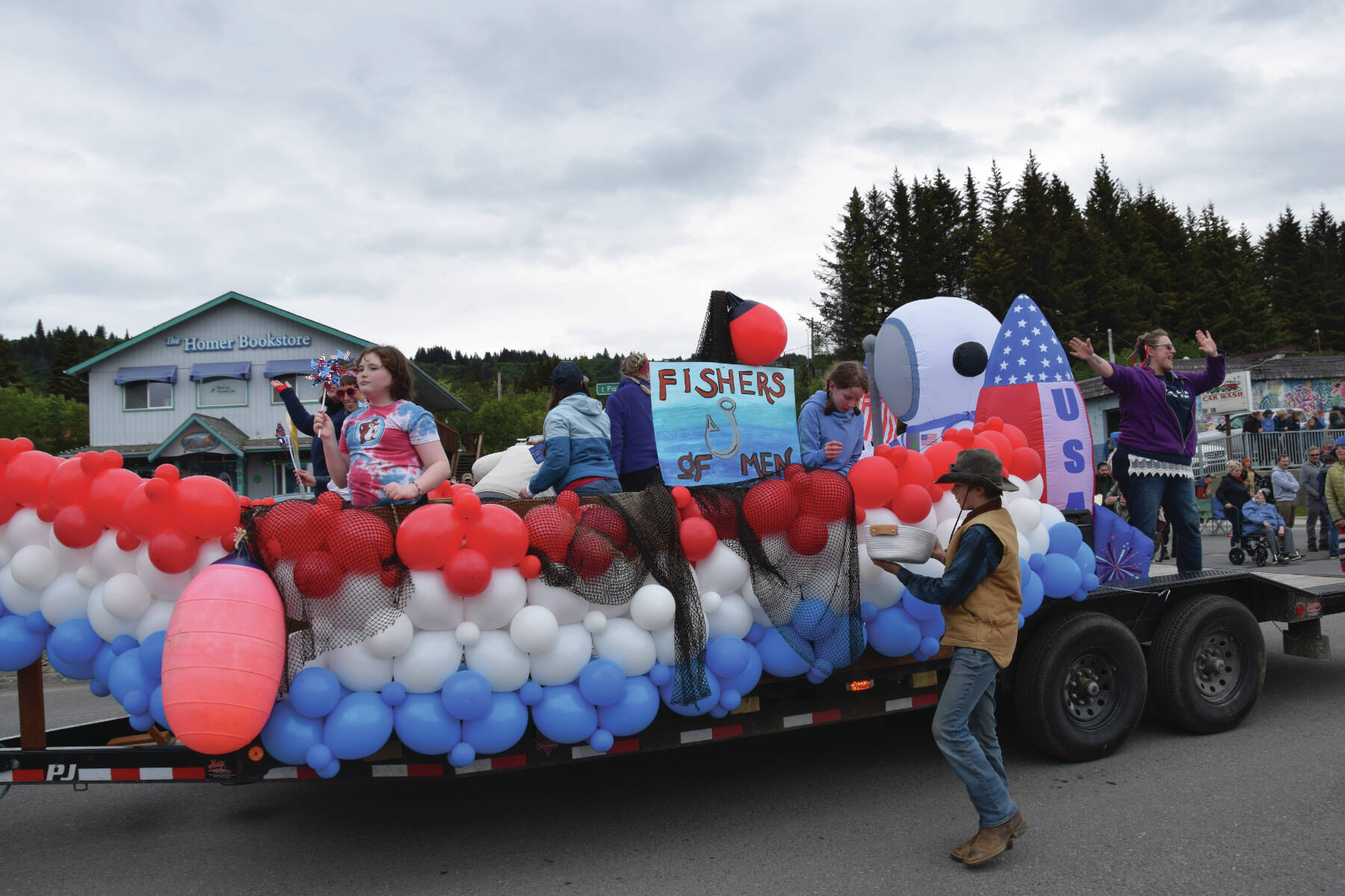 The Fishers of Men float travels down Pioneer Avenue at the “Seas the Day” parade on Tuesday, July 4<ins>, 2023</ins> in Homer<ins>, Alaska</ins>.