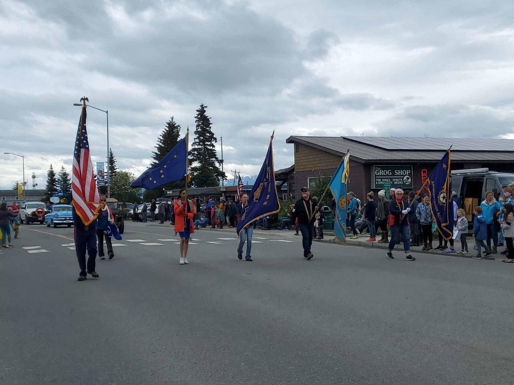 The American Legion, winner of the Red Lantern Award, walks down Pioneer Avenue during the “Seas the Day” Fourth of July parade on Tuesday, July 4, 2023 in Homer, Alaska. (Delcenia Cosman/Homer News)