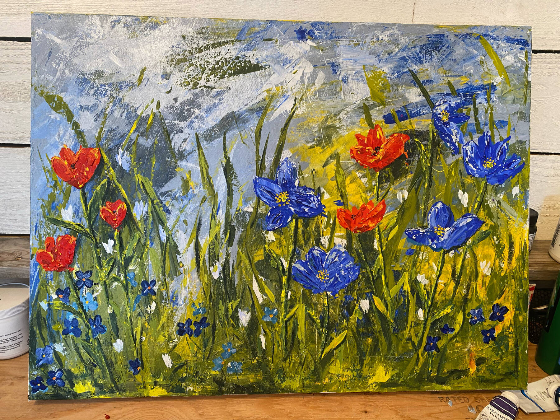 “Summer Poppies,” an acrylic medium and pallet knife painting by Tracy Hansen is on display at Grace Ridge Brewing through July. Photo courtesy of Tracy Hansen
