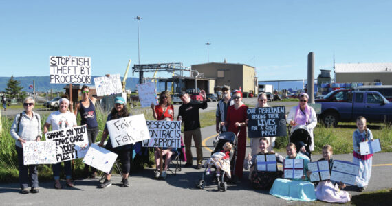 Photo by Emilie Springer/ Homer News
Homer residents support Bristol Bay salmon price protest in Homer on Saturday.