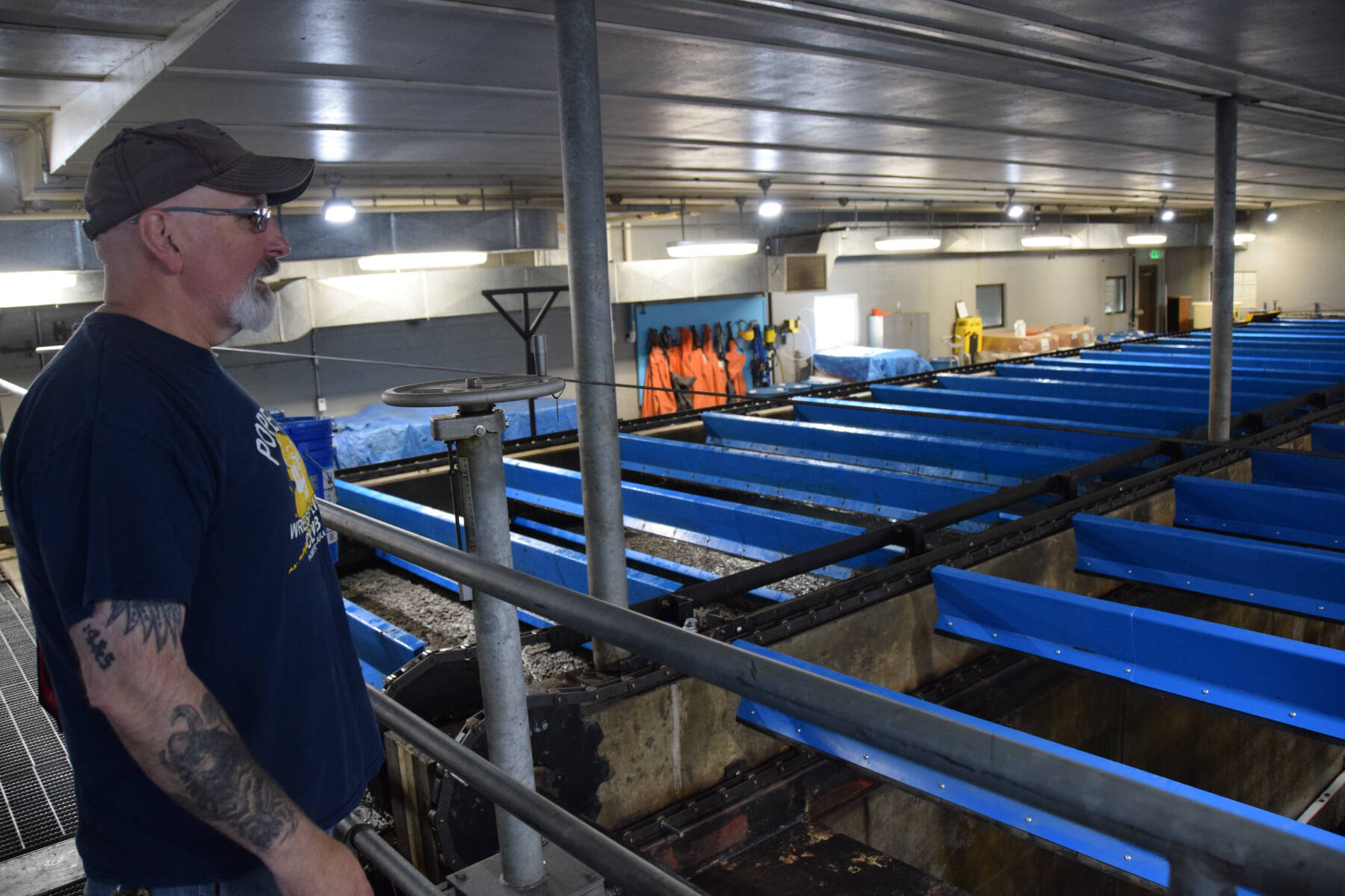 Superintendent Todd Cook explains the repairs to the skimmer drive being conducted on the Homer Sewer Treatment Plant’s clarifier on Thursday, July 27, 2023 in Homer, Alaska. (Delcenia Cosman/Homer News)