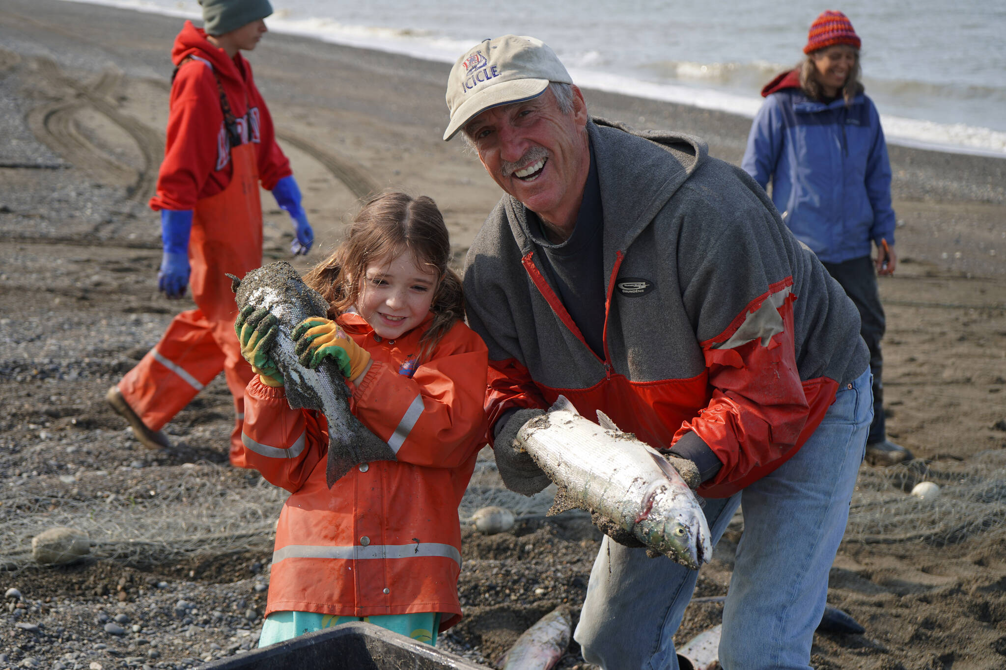 Carmen and Gary Hollier stand with sockeye salmon caught at a test site for selective harvest setnet gear in Kenai, Alaska, on Tuesday, July 25, 2023. (Jake Dye/Peninsula Clarion)