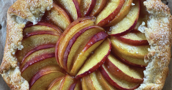 Photo by Tressa Dale/Peninsula Clarion
Fresh ripe peaches are wrapped in a buttery crust in this peach galette recipe.