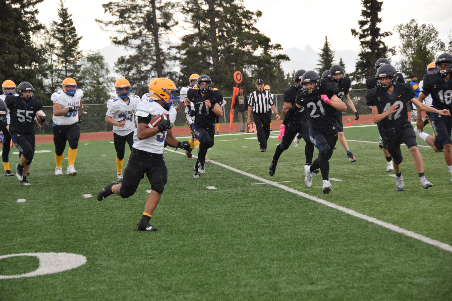 Barrow’s Gabriel Ortilla faces off against incoming Mariners in the fourth quarter of the home opener game on Saturday, Aug. 12, 2023 in Homer, Alaska. (Delcenia Cosman/Homer News)