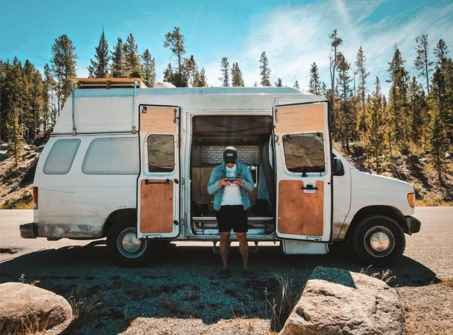 Photographer Jason Kim is photographed next to his camper at the Wind Rivers in Wyoming in August 2020. Photo provided by Jason Kim