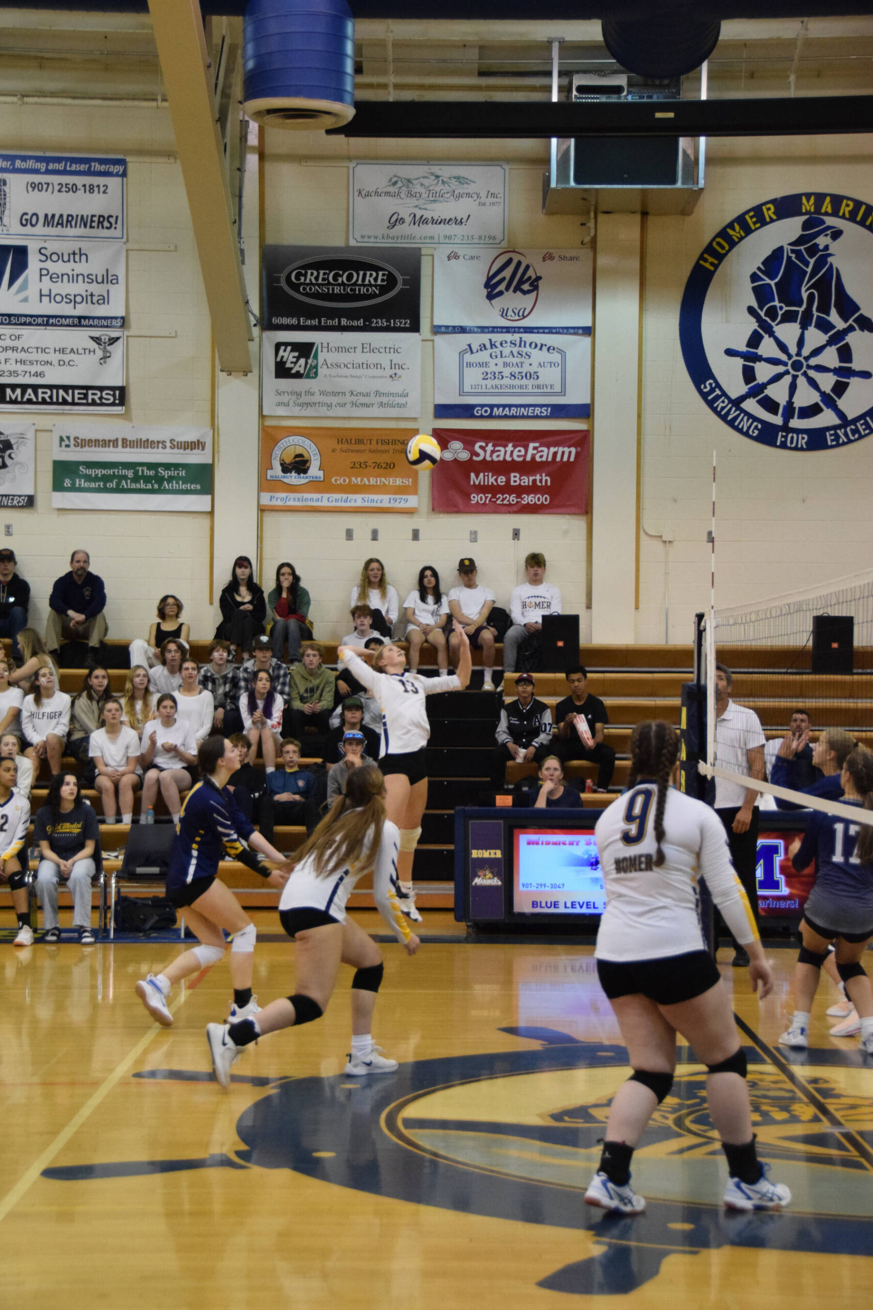 Outside hitter Gracie Miotke spikes the ball at the varsity game versus Soldotna on Friday, Sept. 1, 2023 in Homer, Alaska. (Delcenia Cosman/Homer News)