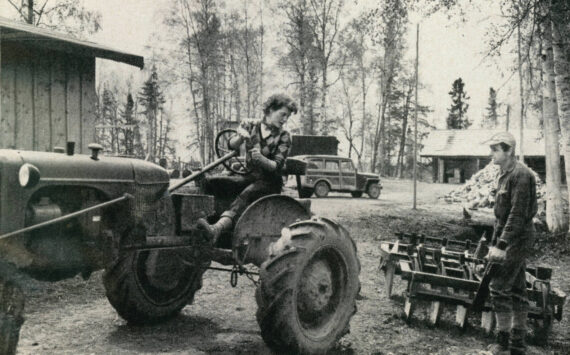 Rusty Lancashire backs up the family tractor so her husband Larry can connect it to the disc for their fields. (1954 photo by Bob and Ira Spring for Better Homes & Garden magazine)