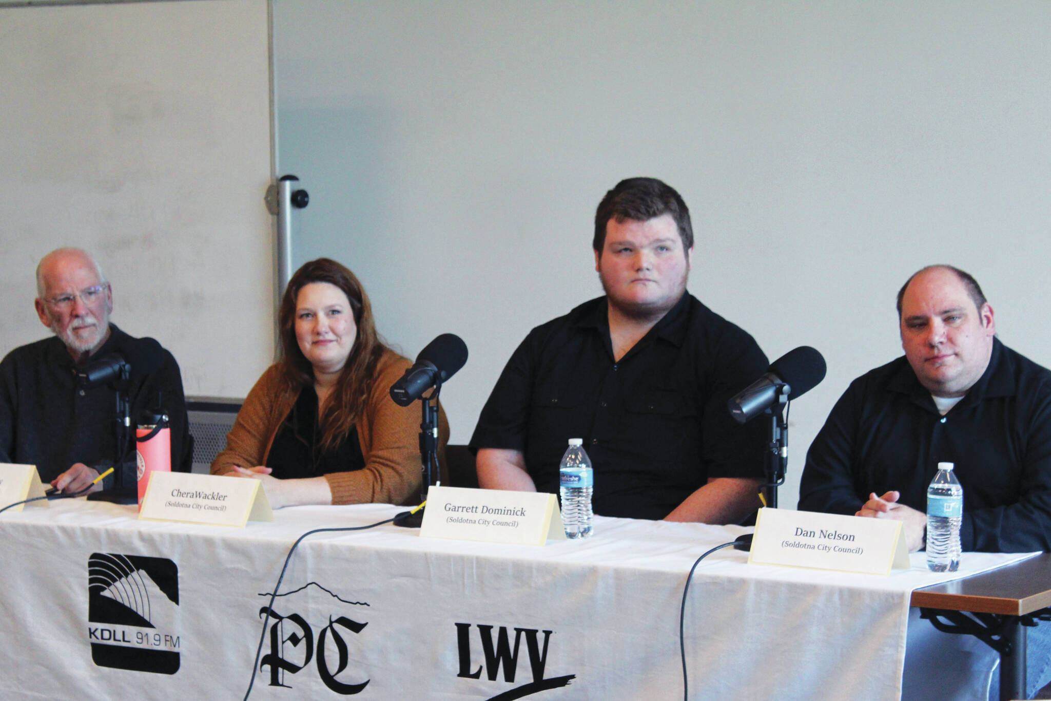 Jake Dye/Peninsula Clarion
From left: Paul Whitney, Chera Wackler, Garrett Dominick and Dan Nelson participate in a Soldotna City Council candidate forum at the Soldotna Public Library on Monday.