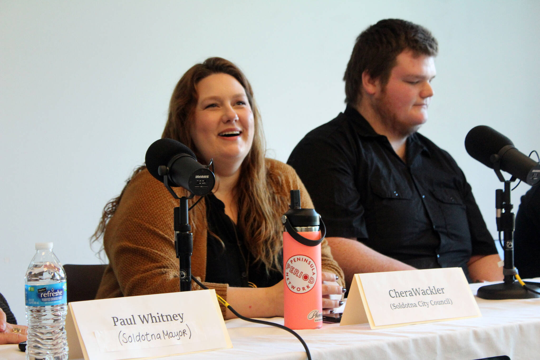 Chera Wackler and Garrett Dominick participate in a Soldotna City Council candidate forum at the Soldotna Public Library in Soldotna, Alaska, on Monday, Sept. 4, 2023. (Jake Dye/Peninsula Clarion)