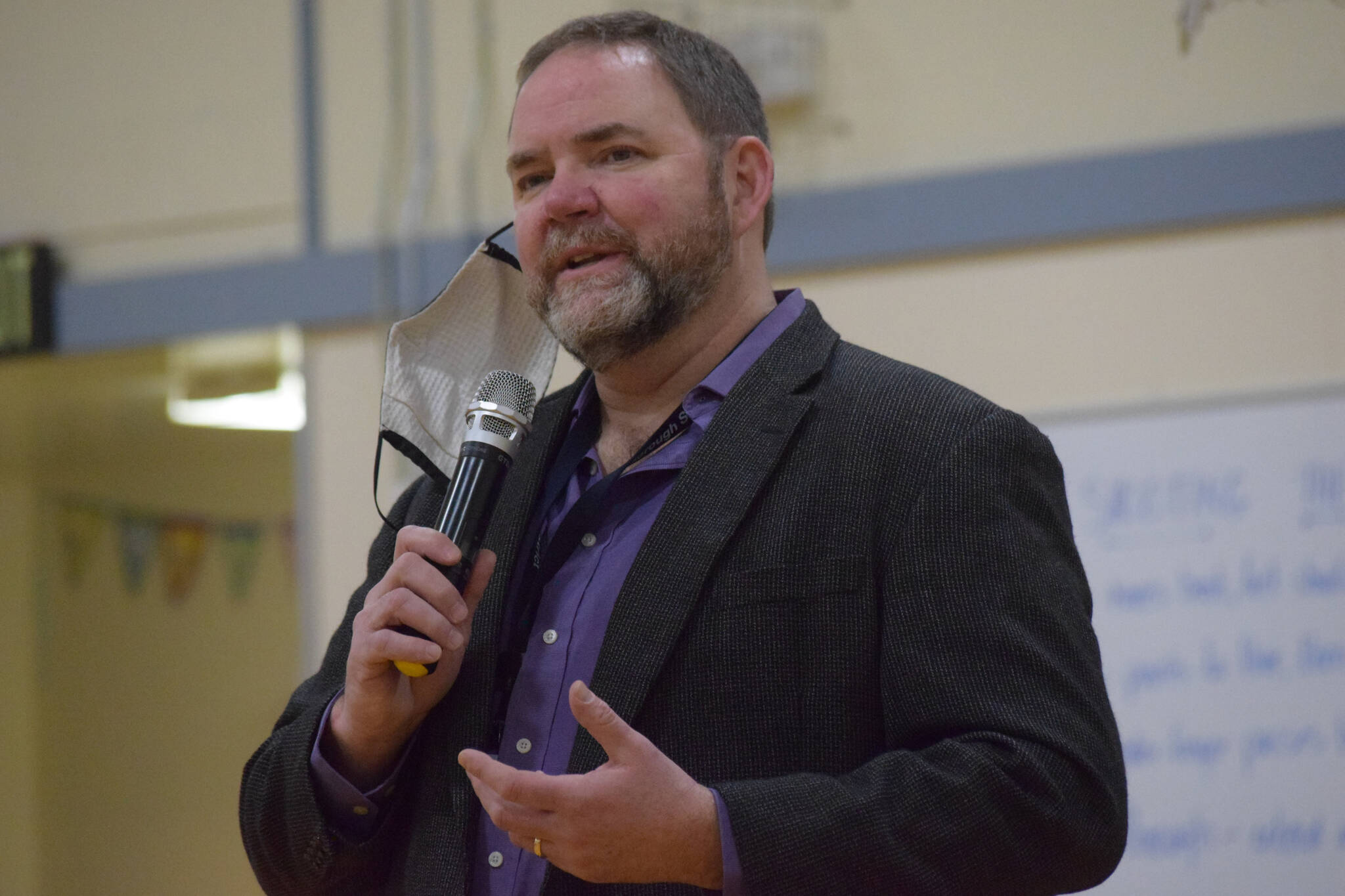 Superintendent Clayton Holland speaks about the National Blue Ribbon award during an assembly at Soldotna Montessori Charter School on Friday, Jan 14, 2022. (Camille Botello / Peninsula Clarion)