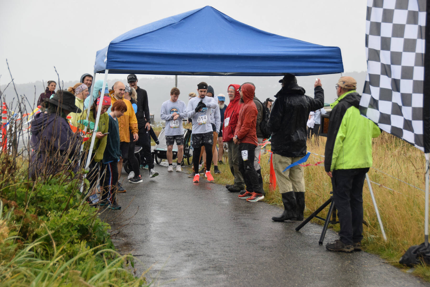 Runners participating in the first annual 5K Run for Recovery gather at the starting line on Saturday, Sept. 16, 2023 in front of Kevin Bell Arena on the Spit in Homer, Alaska. (Delcenia Cosman/Homer News)