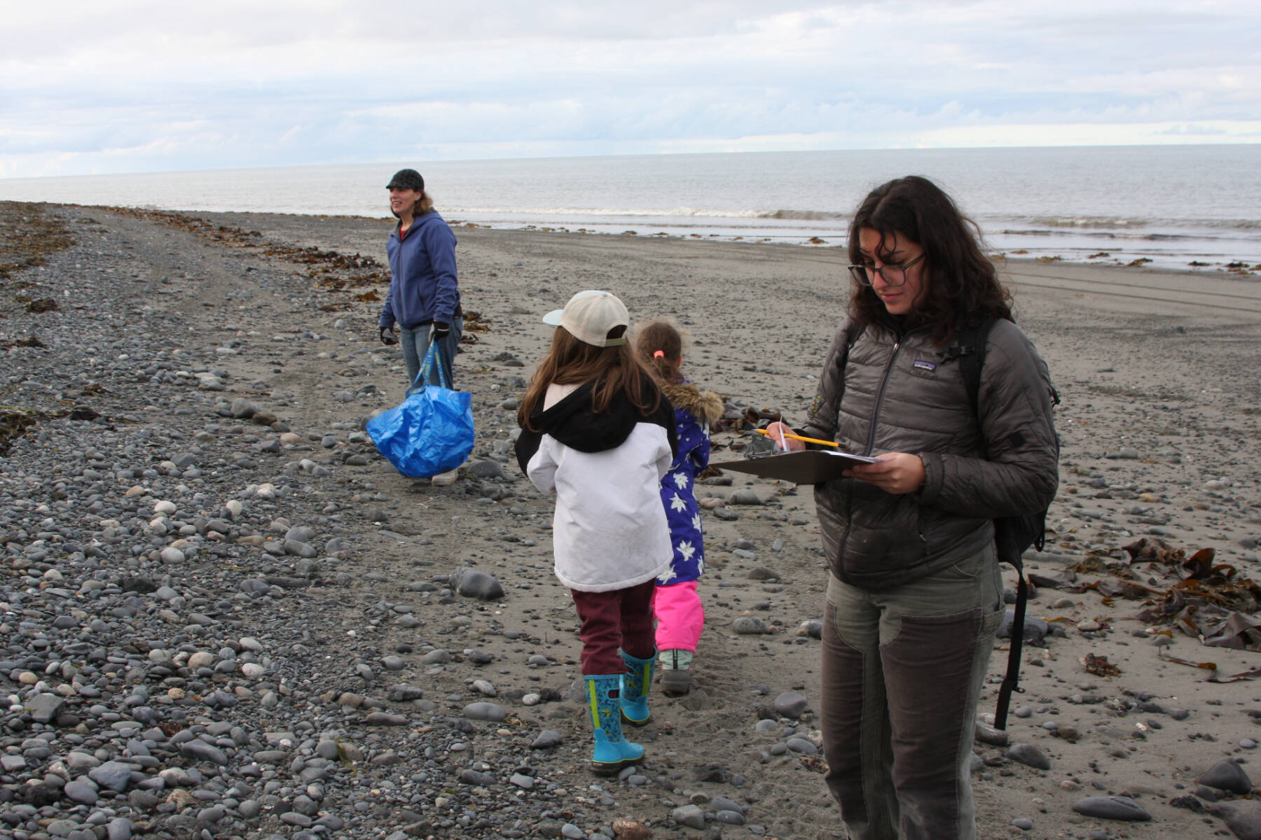Wynn Visitor Center coordinator Maya Nabipoor (right) records marine debris and animal carcasses found during the Anchor Point CoastWalk Clean-up on Saturday, Sept. 23, 2023 at the Anchor River State Recreation Area in Anchor Point, Alaska. (Delcenia Cosman/Homer News)