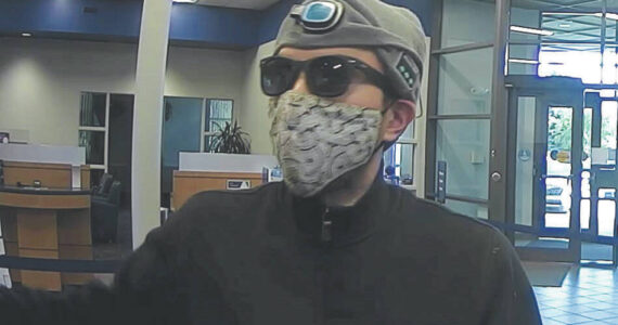 A photo distributed by the Federal Bureau of Investigation shows a man who allegedly robbed the Global Credit Union branch located in Anchorage, Sept. 19, 2023. Tyler Ching, 34, was arrested last week on charges related to robberies at the credit union and an Anchorage bank. (Photo courtesy Federal Bureau of Investigation)