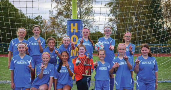 Homer Husky girls soccer take season trophy on Sunday, Oct. 1 at the Homer Mariner field. (Photo provided by Christopher Kincaid)
