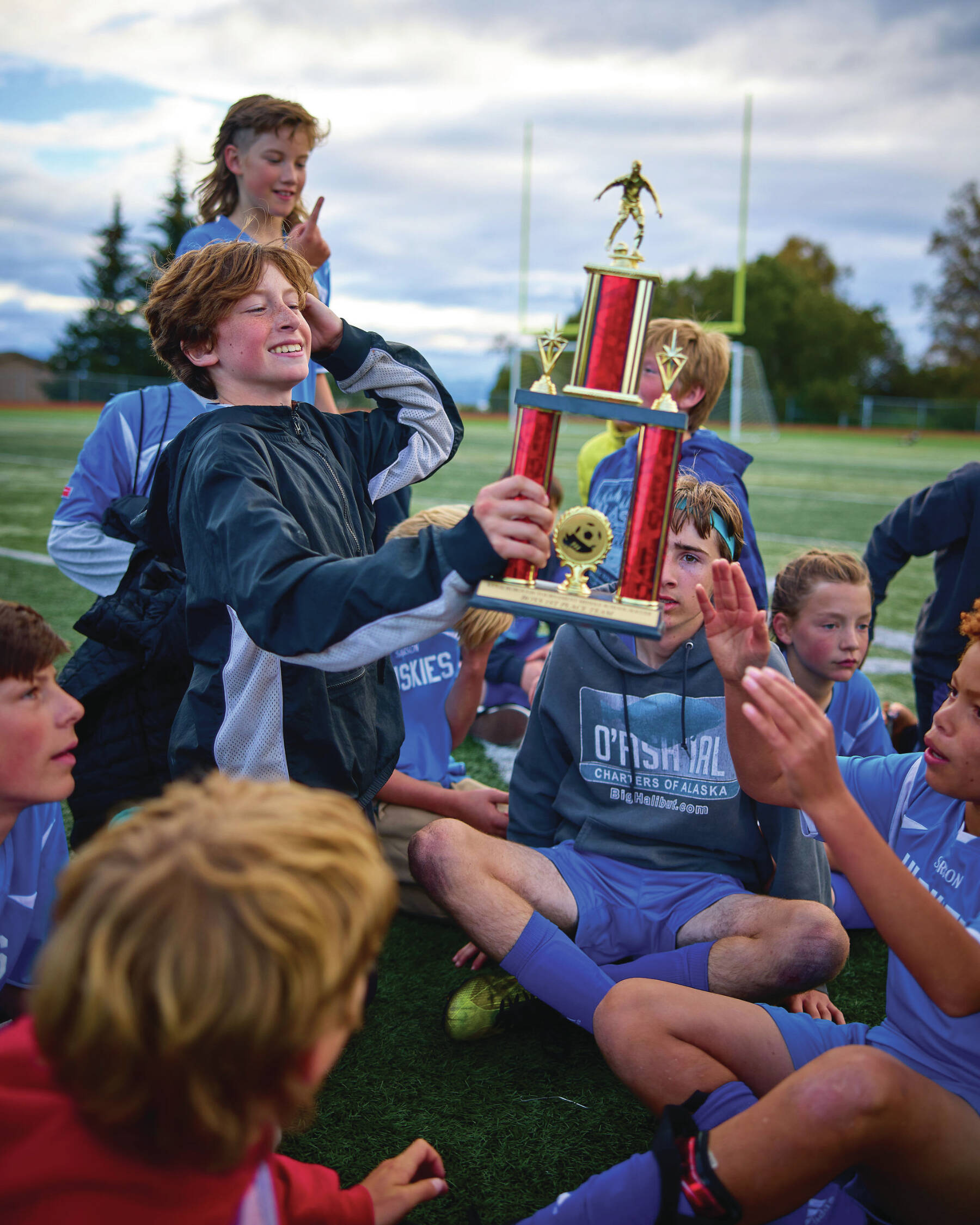 Homer Middle School boys celebrate win of the fall soccer trophy on Sunday, Oct. 1 at the Homer Mariner field. (Photo provided by Christopher Kincaid)