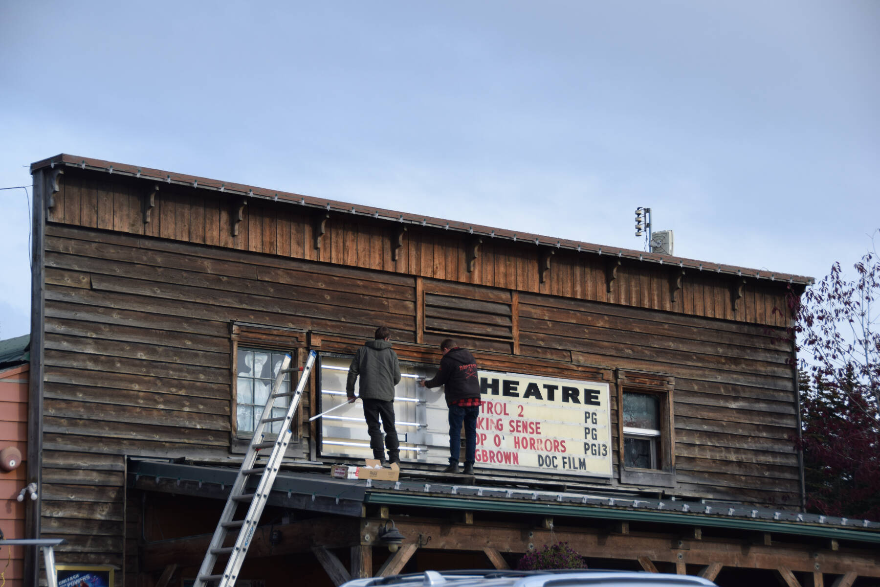 The marquee at the Homer Theatre gets some new lighting on Friday, Oct. 13, 2023 in Homer, Alaska. (Finn Heimbold/Homer News)