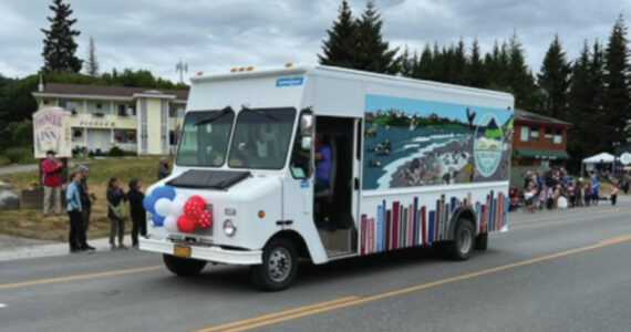Homer Public Library's BOB the bookmobile ends the 2023 summer season.  The bookmobile participates here in the Homer Fourth of July parade.  Photo provided by Lin Hampson.