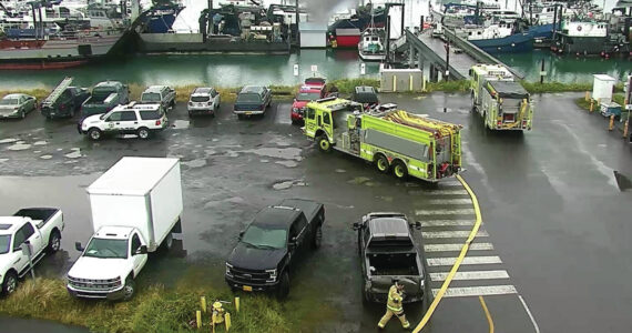 Photo provided by a Homer Harbor surveillance camera
Fire crew respond to a vessel fire on Oct. 13 in the Homer Harbor.
