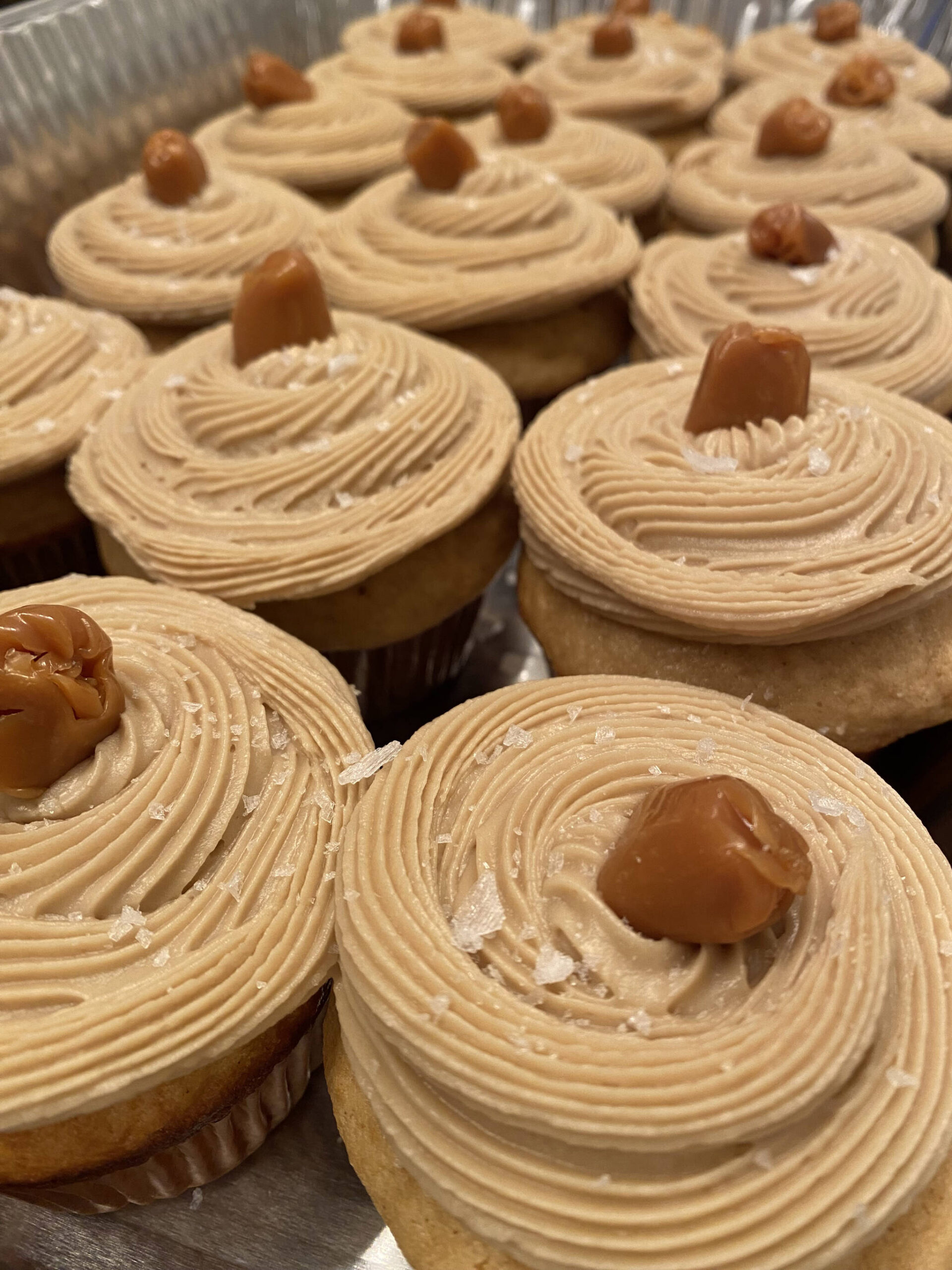 These salted caramel cupcakes topped with caramel candy balance sweetness with Maldon salt. (Photo by Tressa Dale/Peninsula Clarion)