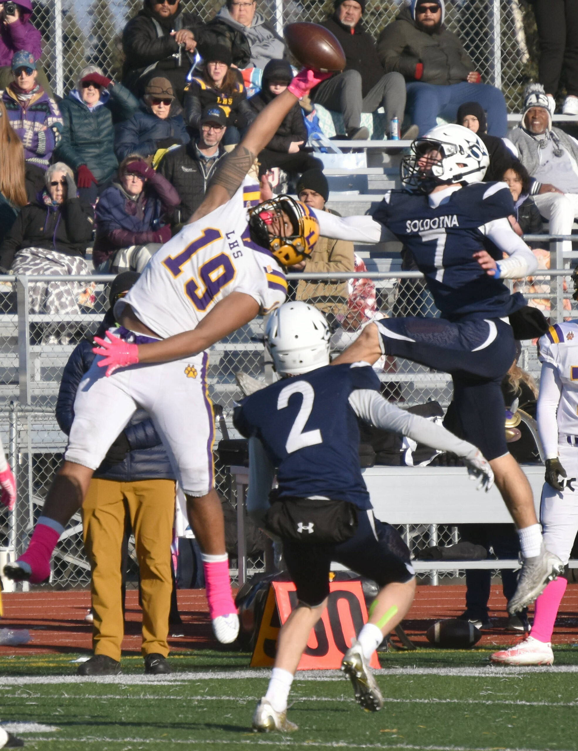 Lathrop’s Jirah Simeta and Soldotna’s Zac Buckbee fight for an incomplete pass Saturday, Oct. 21, 2023, in the Division II championship game at Service High School in Anchorage, Alaska. (Photo by Jeff Helminiak/Peninsula Clarion)